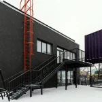 Why Modular Construction Is Gaining Notice about a modern construction painted black and Green.